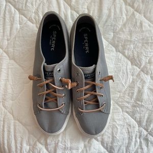Sperry Canvas slip on sneakers.
